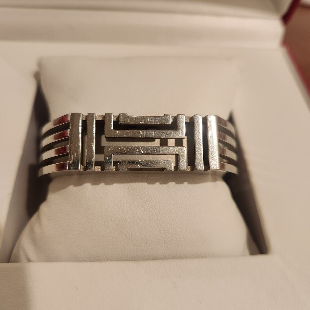 Tory Burch Silver Hinged Fitbit Bracelet Logo